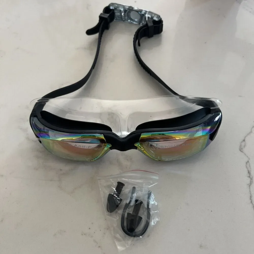 Laconha Swim Goggles Adjustable Anti Leak Anti Fog UV lens Unisex New In Box